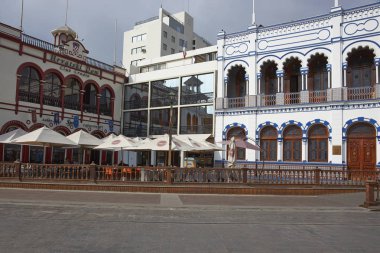 Iquique, Tarapaca Region, Chile - August 28, 2017: Historic buildings in Plaza Arturo Prat in the old quarter of Iquique on the Pacific coast of northern Chile. clipart