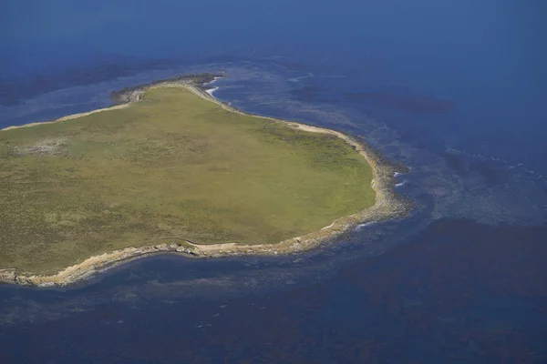 View from an aircraft flying over Bleaker Island in the Falkland Islands.