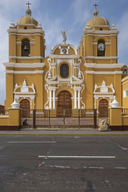 Bright yellow colonial style Cathedral in the Plaza de Armas of Trujillo, Peru