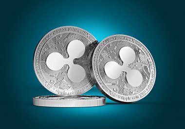 Üç dalgalanma sikke (Xrp) kavramı birlikte yavaşça aydınlatılmış bir mavi arka plan üzerinde yığılmış gümüş. 3D render. (yeni sanal para)
