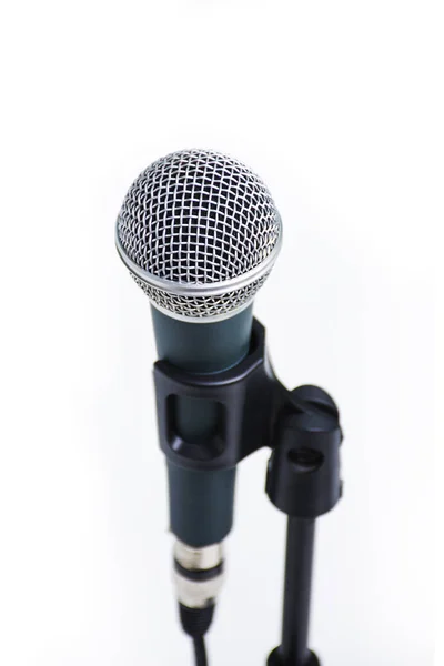 Microfone vocal profissional em stand isolado no backgro branco Imagem De Stock