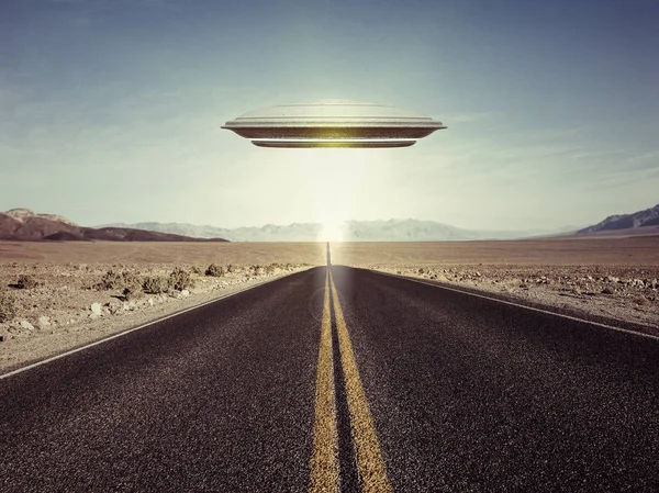 3d illustration of a ufo over an empty desert road — Stock Photo, Image