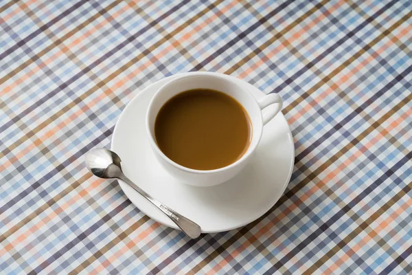 O café agradável na mesa — Fotografia de Stock