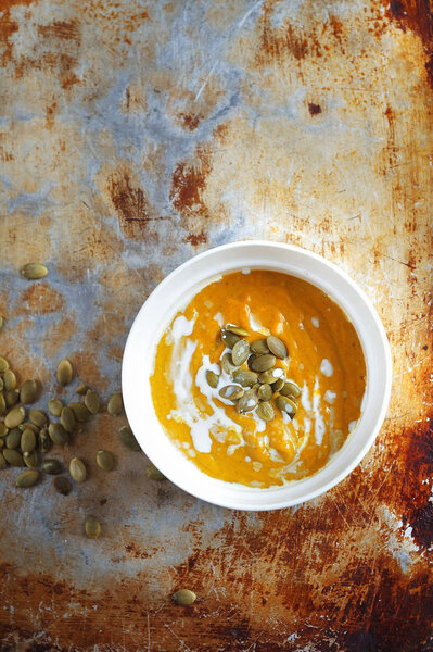 Pumpkin soup with seeds and cream