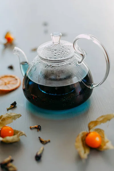 Thai blue tea in a glass teapot