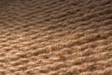 Kalın ip. İç dekorasyonda ip var. Doğal kenevir. Çatı katı tarzı element. Jüt arka plan. Kabataslak iplik yakın plan. Sarmalanmış ip. Kedi pençesinin ucu için tuval.