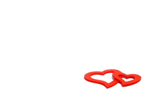2 หัวใจสีแดงติดกันบนพื้นหลังสีขาว — ภาพถ่ายสต็อก