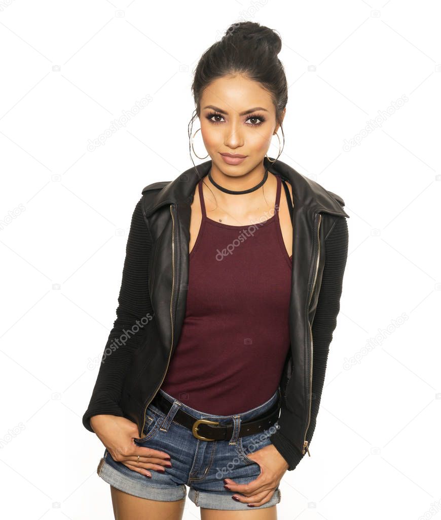 Beautiful young woman wearing leather jacket