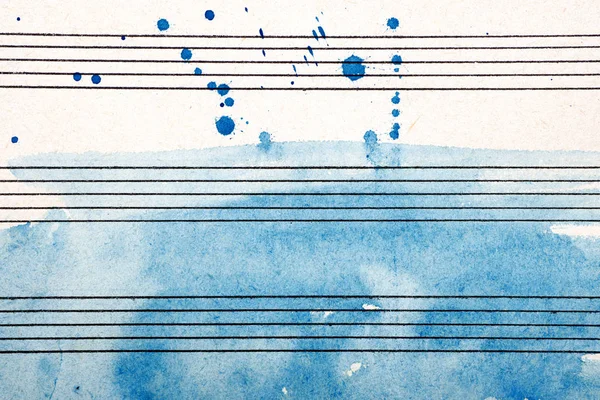 Old music sheet in blue watercolor paint. Blues music concept. Abstract blue watercolor background.