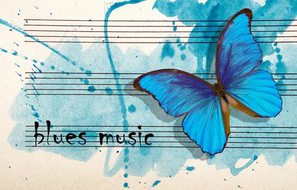 Morpho blue butterfly and notes. Butterfly melody. Photo of old music sheet in blue watercolor paint. Blues music concept. Abstract blue watercolor background. copy spaces