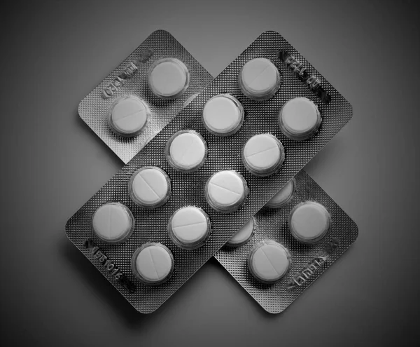 Lek tabletki tabletki czarno-białe — Zdjęcie stockowe