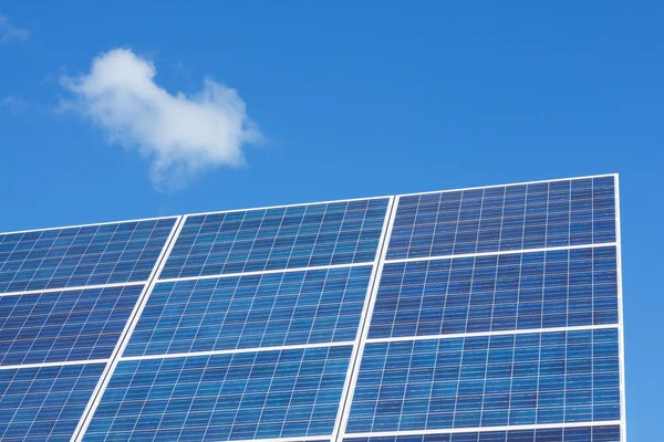 Solar panels on blue sky — Stock Photo, Image