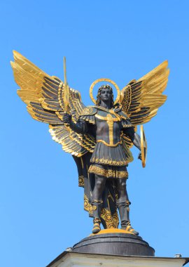 Golden statue of Archangel Michael  in Kiev clipart