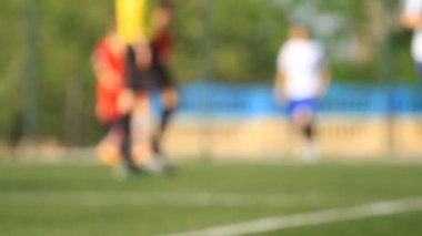 Futbolcuların ve hakemlerin bacakları bulanık