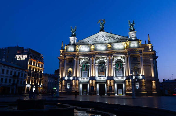 Lviv, Ukraine - August 20, 2016:  The opera house is illuminated by architecture at night in Lviv , Ukraine.