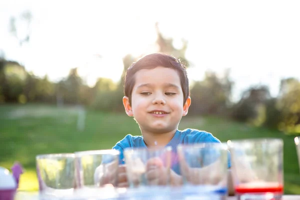 Young Boy Having Fun Coloring Easter Eggs — Stock Photo, Image