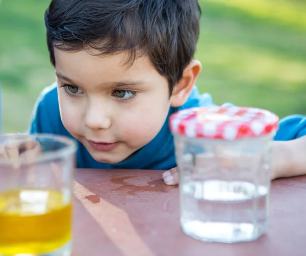 Young Cute Boy Looking Colored Water — Stock Photo, Image