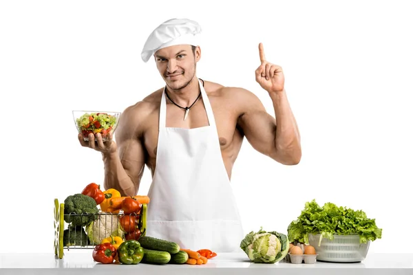 Homem fisiculturista em branco toque blanche e cozinhar avental protetor — Fotografia de Stock