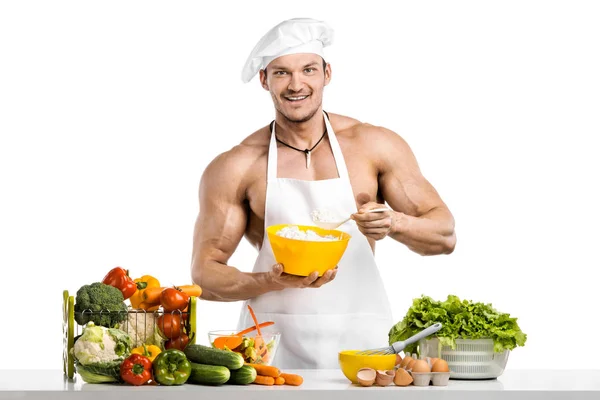 白色的无边帽的男子健美运动员布兰奇和厨师的防护围裙 — 图库照片