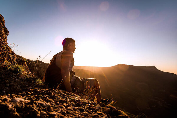 traveler meditate on mountain