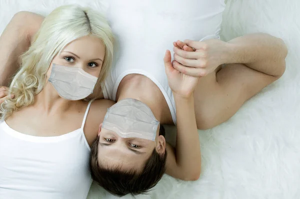 Pretty Couple Medical Mask Lie Floor Concept Coronavirus Epidemic — Stock Photo, Image