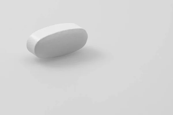 One White Medical Pill Closeup White Background Empty Space Text — Stock Photo, Image