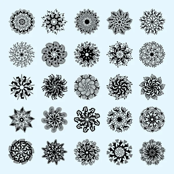 Set de 25 flocons de neige de Noël dessinés à la main pour la conception hivernale — Image vectorielle