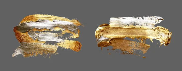 Handzeichnung Goldpinsel Pinselstrich Farbfleck auf grauem Hintergrund — Stockvektor