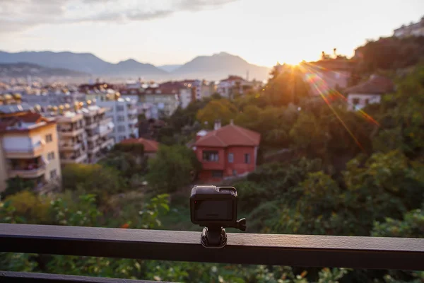 Taking timelaps video on action camera on sunset or sunrise. Turkey, Alanya