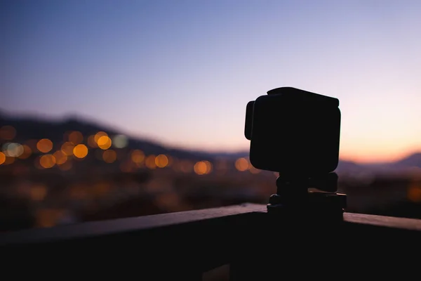 Taking timelaps video on action camera on sunset or sunrise. — Stock Photo, Image