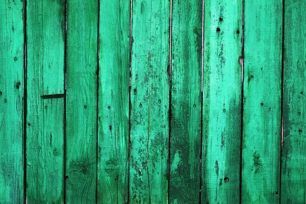 Dark green old wooden boards. Backgrounds and textures fence pai