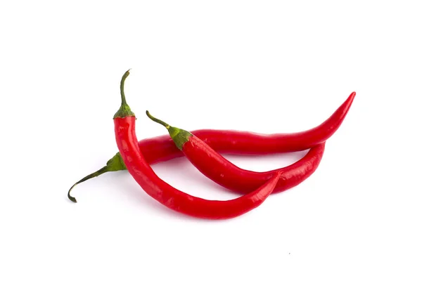 Red bitter pepper on a white background. Three Red bitter pepper — Stock Photo, Image