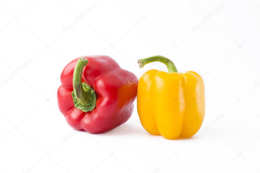 Fresh vegetables on a white background.Yellow pepper, red pepper on a white background