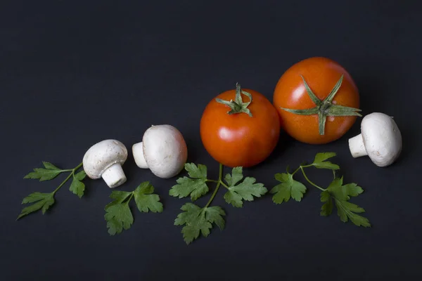 Red Tomatoes Mushrooms Greens Dark Background Composition Tomatoes Ceps Black — Stock Photo, Image