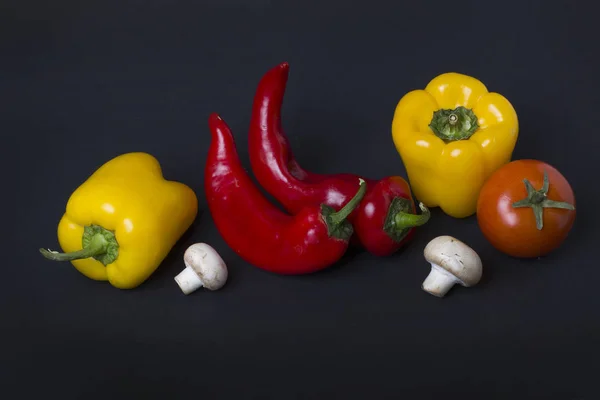 Yellow Red Peppers Tomatoes Dark Background Composition Peppers Tomatoes Black — Stock Photo, Image