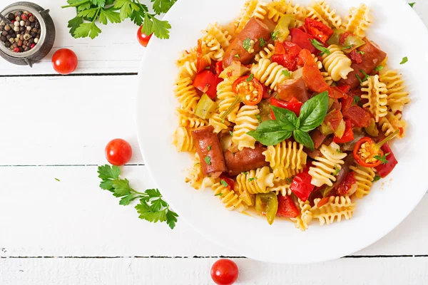 Pasta with tomato sauce with sausages — ストック写真