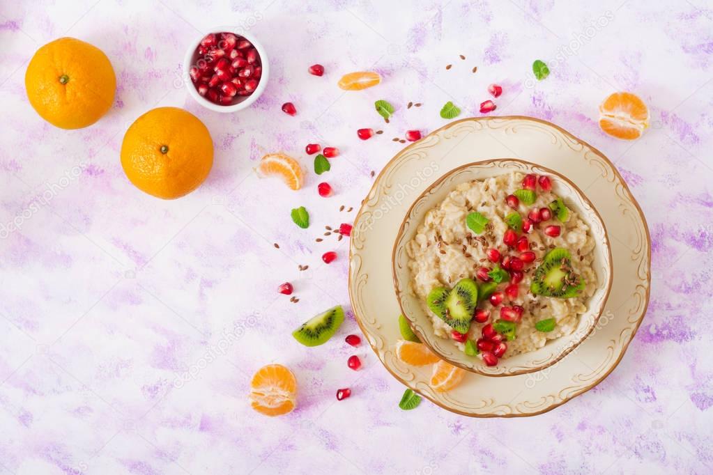 Tasty and healthy oatmeal porridge with fruits
