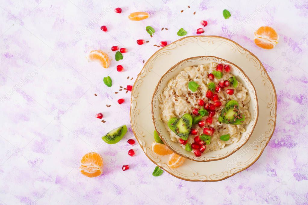 Tasty and healthy oatmeal porridge with fruits