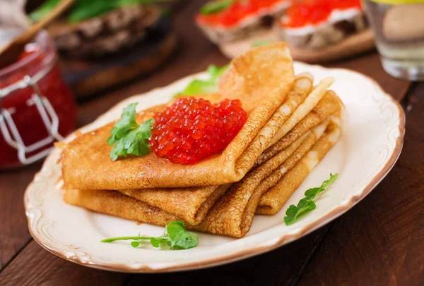 Pancakes with red caviar — Stock Photo, Image