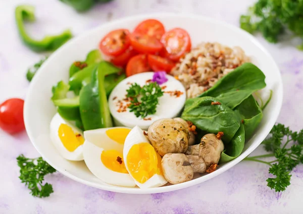 Oatmeal porridge, eggs and fresh vegetables — Stock Photo, Image