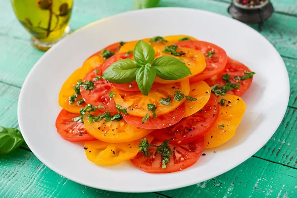 Salad of yellow and red tomatoes — Stock Photo, Image