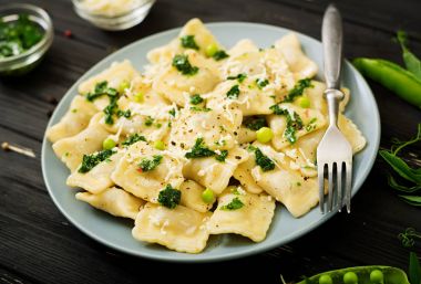 Ravioli with ricotta and green peas clipart