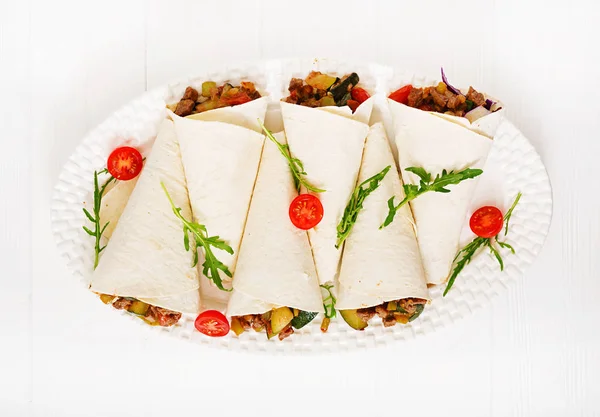 Burritos wraps with beef and vegetables — Stock Photo, Image