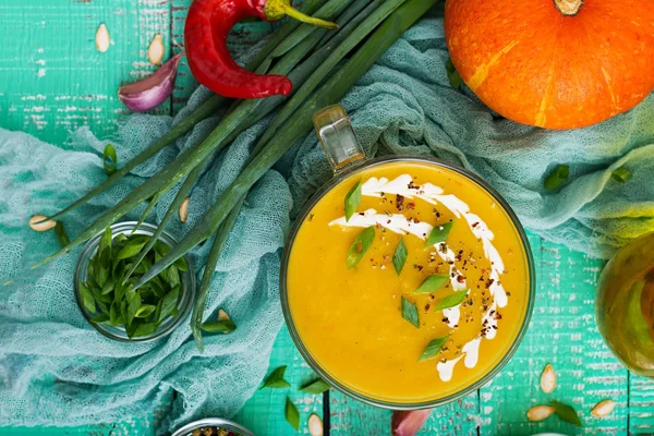 Cream of pumpkin soup with sour cream — Stock Image Cream of pumpkin soup with sour cream Stock Photo