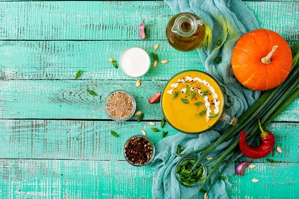 Cream of pumpkin soup with sour cream — Stock Image Cream of pumpkin soup with sour cream Stock Photo