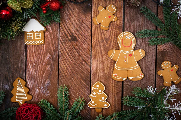 Christmas cookies and tinsel — Stock Photo, Image