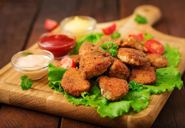 Chicken nuggets and sauces — Stock Photo, Image