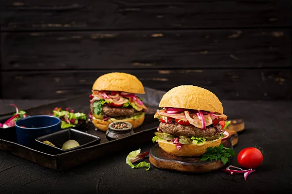 Two Big Hamburgers Fried Bacon Dark Background — Stock Photo, Image