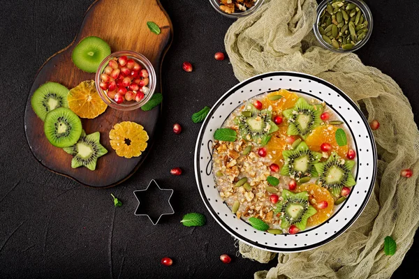 Tasty Healthy Oatmeal Porridge Fruit Slices Pomegranate Seeds Nuts Bowl — Stock Photo, Image