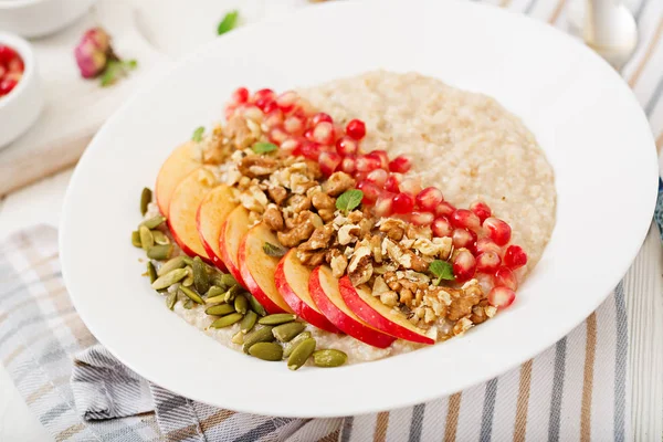 Tasty Healthy Oatmeal Porridge Apple Slices Pomegranate Nuts Bowl — Stock Photo, Image